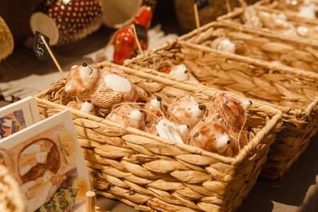 Sale of handmade ceramic Christmas tree toys at the Christmas Fair. Black Friday for the winter holidaysの写真素材