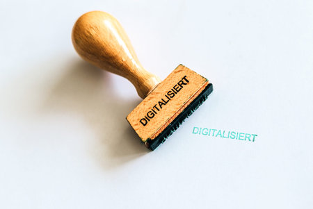 A wooden stamp marks the geman word digitalisiert which means digitized
