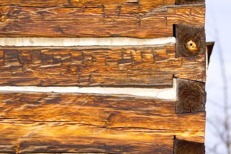 End of log cabin wall showing jointsの写真素材