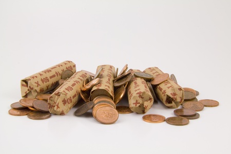 Cents wrapped and unwrapped on a white background.の写真素材