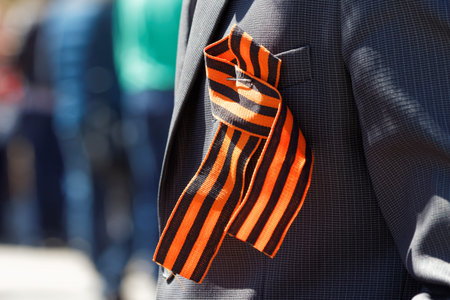 Saint George ribbon on his lapel. The feast day of victory on May 9th