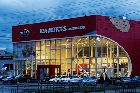 Ulyanovsk, Russia - September 17, 2016: Building of KIA MOTORS car selling and service center with KIA sign on a background of the evening sky.のeditorial素材