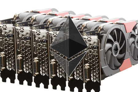 Ethereum Crypto Currency concept. Ethereum sign on the background of a mining farm with array of GPUs graphic cards. Isolated on white.の写真素材