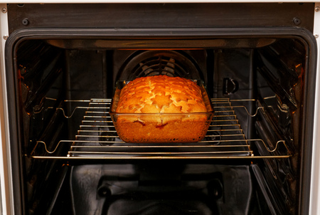 Homemade berrys pie is baked in the oven. Shallow focus.の写真素材