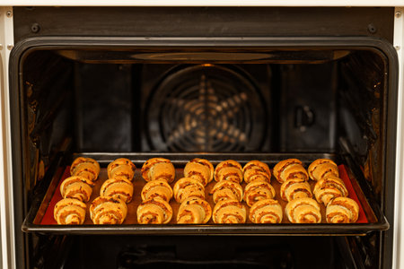 Homemade sweet buns baked in the home oven. Shallow focus.の写真素材