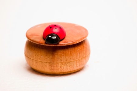 decorative boxes made of wood with ladybirdの写真素材