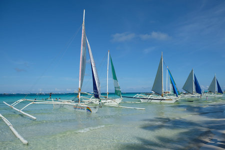 Boracay Philippines - colourful sailing boats at the beach