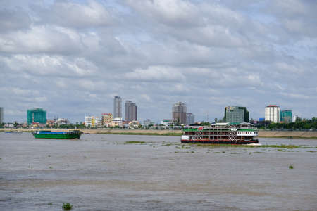 Cambodia Phnom Penh - Mekong River with cargo tourist shipsのeditorial素材