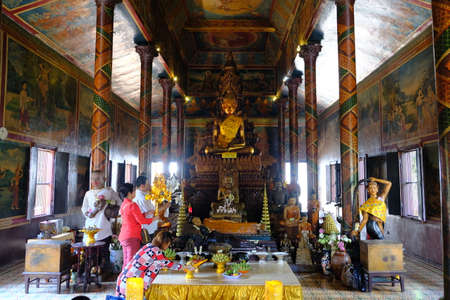 Cambodia Phnom Penh - Wat Langka House of Devotion with golden Buddha statueのeditorial素材