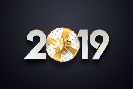 Creative background, numbers 2019 and festive confetti, spiral ribbons on a dark background. Happy New Year 2019. Decoration element with tinsel, copy space.の写真素材