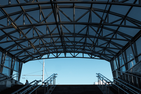 Exit from the underpass, blue sky, glass ceiling.の写真素材