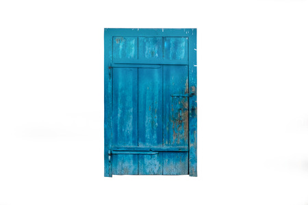 closed old blue wooden door isolated on white backgroundの写真素材