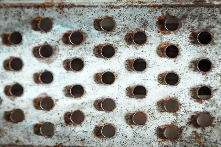 Close up of a vintage metal graterの写真素材