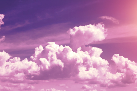 Creative background, pink, fluffy, vanilla clouds. The concept of lightness, magic, magic, fairy tale, good. Background for cards, flyers.の写真素材