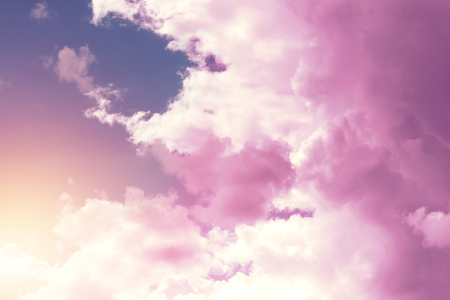 Creative background, pink, fluffy, vanilla clouds. The concept of lightness, magic, magic, fairy tale, good. Background for cards, flyers.の写真素材