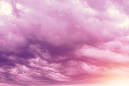 Creative background, pink, fluffy, vanilla clouds. The concept of lightness, magic, magic, fairy tale, good. Background for cards, flyers.の写真素材