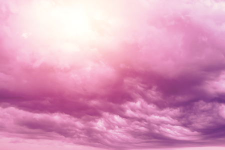Creative background, pink, fluffy, vanilla clouds. The concept of lightness, magic, magic, fairy tale, good. Background for cards, flyers.の写真素材