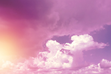 Creative background, pink, fluffy, vanilla clouds. The concept of lightness, magic, magic, fairy tale, good. Background for cards, flyers.の写真素材