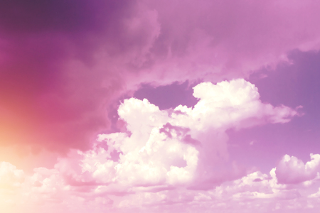 Creative background, pink, fluffy, vanilla clouds. The concept of lightness, magic, magic, fairy tale, good. Background for cards, flyers.の写真素材