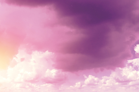 Creative background, pink, fluffy, vanilla clouds. The concept of lightness, magic, magic, fairy tale, good. Background for cards, flyers.の写真素材