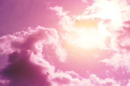 Creative background, pink, fluffy, vanilla clouds. The concept of lightness, magic, magic, fairy tale, good. Background for cards, flyers.の写真素材