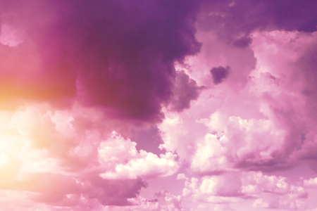 Creative background, pink, fluffy, vanilla clouds. The concept of lightness, magic, magic, fairy tale, good. Background for cards, flyers.の写真素材