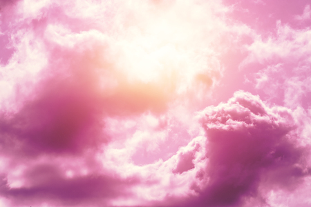 Creative background, pink, fluffy, vanilla clouds. The concept of lightness, magic, magic, fairy tale, good. Background for cards, flyers.の写真素材