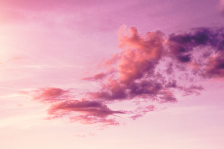 Creative background, pink, fluffy, vanilla clouds. The concept of lightness, magic, magic, fairy tale, good. Background for cards, flyers.の写真素材