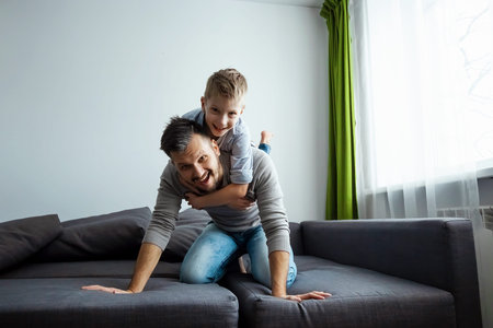 Happy family, Dad and son spend time together, fooling around. Concept of happy father's day, family...