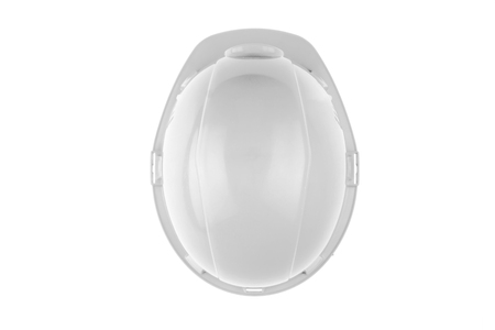 White construction helmet on a light background. The concept of architecture, construction, engineering, design. Copy space. top Viewの写真素材