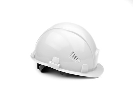 White construction helmet on a light background. The concept of architecture, construction, engineering, design. Copy space.の写真素材