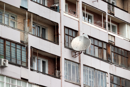 Satellite dishes on the old house. Zhanaozen, Kazakhstan.の写真素材