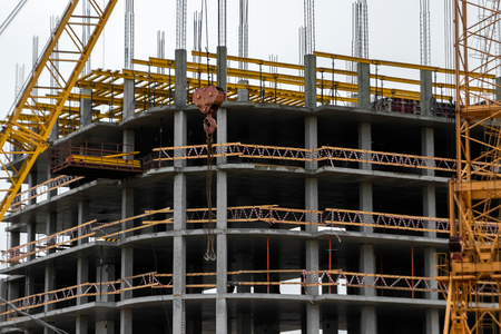 Building construction on monolithic technology. Construction of the building. Concrete frame of the building.の写真素材
