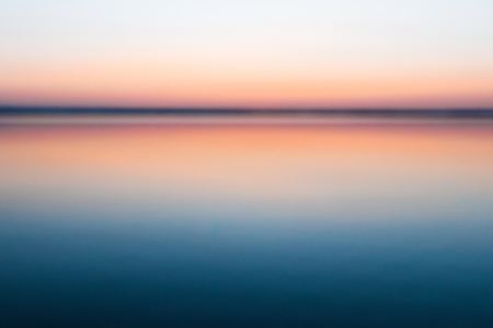 Abstract, blurred background of a pink nature, beautiful bokeh. Concept summer, vacation. Beautiful pink sunsetの写真素材