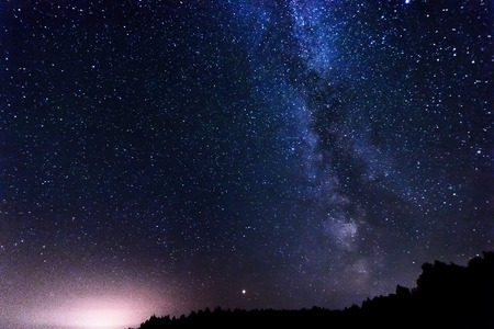 Starry sky, milky way, beautiful landscape, night time, Belarus.の写真素材