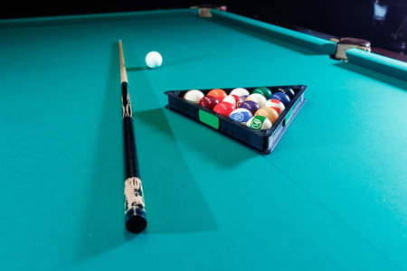 Billiard ball in the triangle on the billiard table, American billiards. Sports games, outdoor...