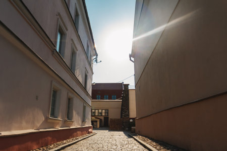 Narrow stone city street, masonry, ancient city.