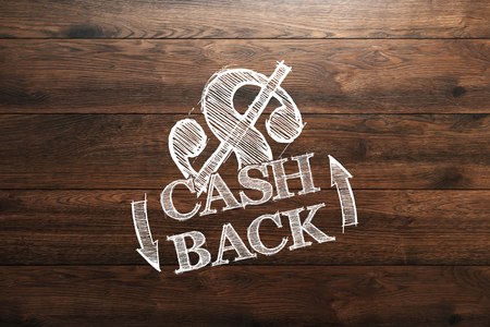 Inscription Cash Back, an image of the emblem on a wooden background. Icon, A symbol of cash back. The concept of business, finance.の写真素材