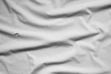 abstract blurred white background with different shades of color wrinkled cloth