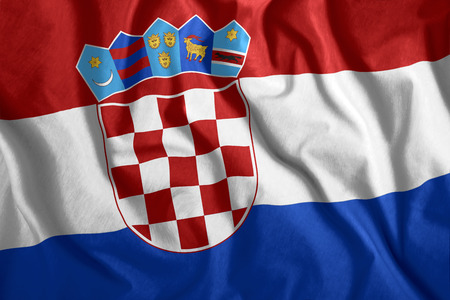 The Croatian flag is flying in the wind. Colorful national flag of Croatia. Patriotism, patriotic symbol.の写真素材