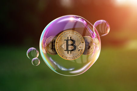 Gold Coins Bitcoin in a soap bubble. The concept of instability of the crypto currency, electronic...