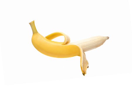 A banana isolated on a white background.の写真素材