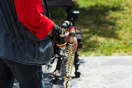 Mens hand in ethnic beautiful bracelets close-upの写真素材