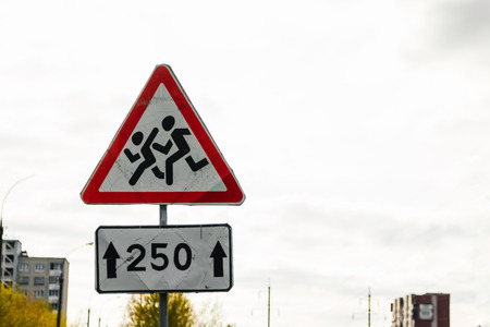 Road sign, traffic sign. School sign.Traffic sign road on blur road abstract backgroundの写真素材