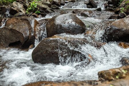 Landscape, mountain stream, cascades on a mountain river. The concept of active holidays, holidays.の写真素材