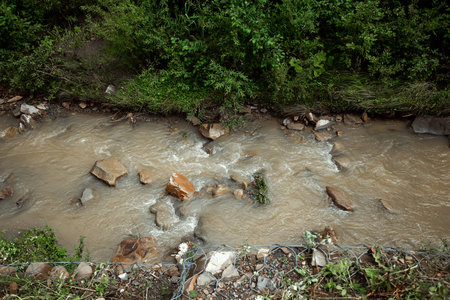 Landscape, mountain stream, cascades on a mountain river. The concept of active holidays, holidays.