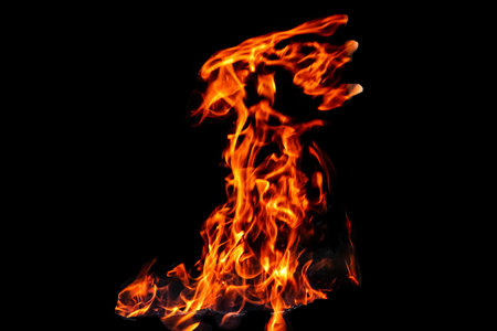 Fire, flames on a black background isolate. Concept fire grill heat weekend barbecue