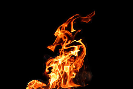 Fire, flames on a black background isolate. Concept fire grill heat weekend barbecueの写真素材