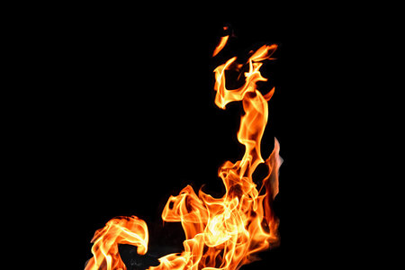 Fire, flames on a black background isolate. Concept fire grill heat weekend barbecue