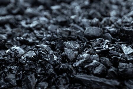 Dark coal texture, coal mining, fossil fuels, environmental pollutionの写真素材